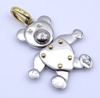 Auktion 332 / Los 1035 <br>Designer Teddybär Anhänger "Pomellato" Stahl / Gold 0.750 , L. 53 x 37mm, 17,3g.