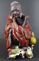 Auktion 332 / Los 15068 <br>Figur "Mongole", H-22 cm, kl. Abplatzer etc, Alters-u. Gebrauchsspuren.