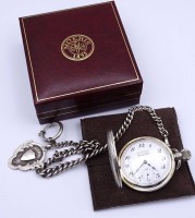 Auktion 332 / Los 2088 <br>Taschenuhr "Moeris", Grands Prix, mechanisch, Werk läuft,versilbert, Innendeckel Datiert 1981, D. 44mm, anbei Uhrenkette aus Sterling Silber 0.925, L. 32cm