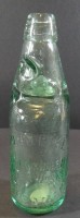 Auktion 332 / Los 10050 <br>hellgrüne Flasche "John Pike Steam mineral water works" Aberaman, mit Glaskugel-Verschluss im Hals, H_22 cm, ca. 0,5 L., um 1880