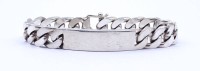 Auktion 333 / Los 1013 <br>Panzerarmband, Identitätsarmband, Sterling Silber 0.925, L. 22,5cm, B. 12mm, 81g.Tragespuren