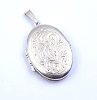 Auktion 334 / Los 1015 <br>Fotomedaillon, Silber 0.835, L. 4,3cm, 7,9g.