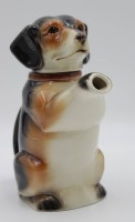 Auktion 334 / Los 9008 <br>Scherzkanne, Dackel, Cortendorf, bemalt in Unterglasur, H-20,5cm.