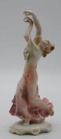 Auktion 334 / Los 8017 <br>Figur, Tänzerrin, ENS Volksstedt, farbig staffiert in Unterglasur, H-21cm.