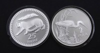 Auktion 334 / Los 6046 <br>2x Silbermünzen, 2 Pula 1986 und 25 Terper 1987, zus. 56,2g., gekapselt, Sterlingsilber 0.925