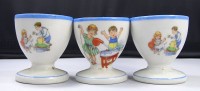Auktion 334 / Los 11 <br>3x Eierbecher mit Kinder Motiven, Gebrauchsspuren