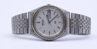 Auktion 500011 / Los  <br>Herren Armbanduhr Seiko SQ, Quartzwerk, D. 35mm, Funktion nicht überprüft