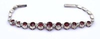 Auktion 375<br>Silber Armband mit Granat?, Silber gepr., L. 15,5cm, 7,4g.