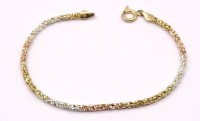 Auktion 337 / Los 1049 <br>Tricolor Armband "Milor", Silber 925/000, L. 18,5cm, 4,7g., B. 2,7mm,
