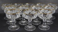 Auktion 337 / Los 10001 <br>12x Desertweingläser, Weinlaubdekor mit Goldrand, H-9 cm, D-6,5 cm