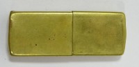 Auktion 338 / Los 16002 <br>Altes Feuerzeug, Seigneur' U.L., Made in England, Messing, 5,9 x 2,3 x 0,9 cm, mit Altersspuren, Dellen