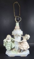 Auktion 345 / Los 16024 <br>gr. Tischlampe mit figürlichen Stand, bemalt, nur Mod. Nr. 7805, ein Mädchen Nase bestossen, H-60 cm, bis zur Fassung 43 cm, B-33 cm