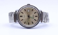 Auktion 341 / Los 2058 <br>Herren Armbanduhr "Timex", Automatikwerk, Werk läuft, D. 35mm, starke Tragespuren, Band beschädigt