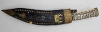 Auktion 338 / Los 15508 <br>Kukri, Nepal, älter, Beingriff, Messingmonturen, Scheide mit Fehölteilen, Beimesser fehlen, ca. L-44cm.