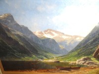 Auktion 338 / Los 4012 <br>Georg Michael MEINZOLT (1863-1948)  "Gudvangen im Nærøyfjord" um 1900, gerahmt, verso betitelt und altes Etikett "Commeter-Hamburg", Öl/Leinen, RG 85x117 cm