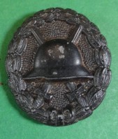Los 7044 <br>Verwundeten-Abzeichen in schwarz, 1.WK, Altersspuren
