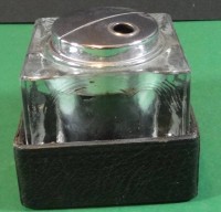 Los 16023 <br>gr. Rowenta-Tischfeuerzeug, Glasblock in Lederstand, H-7 cm, 8x8 cm, 70-er Jahre