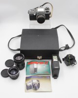 Auktion 341 / Los 16029 <br>Fotoapparat, Porst Reflex CX4, mit div. Zubehör, in Tasche, Gebrauchsspuren, Funktion nicht geprüft