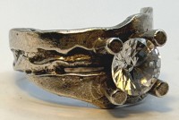 Auktion 373 / Los 1020 <br>925er Silberring mit einem rund facc. klaren Stein, 9,2g., RG 53