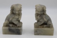 Auktion 340 / Los 15501 <br>Paar Fu-Hunde, Speckstein, China, ca. H-12,5cm B-8cm, div. kl. Abplatzer