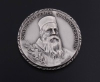 Auktion 340 / Los 6024 <br>800er Silber Medaille, "Für verdienstvolle Arbeit im Samariterwesen", Namensgravur und Datierung, D. 41,8mm, 48,4g.