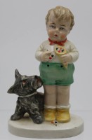 Auktion 340 / Los 9027 <br>Figurengruppe, Knabe mit Schnauzer, W.K.C. Graefenthal, 30/40er Jahre, Stand mit min. Chips, H-12cm.