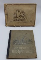 Auktion 341 / Los 7016 <br>2x Sammelalben, Die deutsche Wehrmacht (2 Bilder fehlen) und Der Weltkrieg, je mit staken Gebrauchsspuren