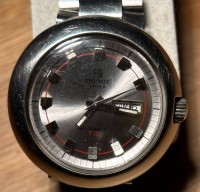 Auktion 341 / Los 2043 <br>Armbanduhr Tissot  T12 Edelstahl Gehäuse Automatisch Swiss made Vintage, orig. Stahlband, gut erhalten und läuft (Seastar?)