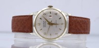 Auktion 342 / Los 2031 <br>Herren Armbanduhr "Genova" De Luxe, Calendar, D. 33,8mm, mechanisch, Werk läuft, Alters- und Gebrauchsspuren