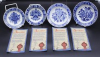 4x kl. Wandteller, Delfts Blauw, florale Dekore, ca. D-16,5cm u. 14cm.