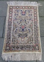 Auktion 343 / Los 13030 <br>Seiden-Teppich, wohl Iran, arabisch signiert, 52x80 cm