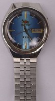Auktion 344 / Los 2000 <br>Orient Automatik Armbanduhr, "Tristar" 21 Jewels, Stahlband, gepflegte Erhaltung, Werk läuft, verso Nr. NW 469285 8B Py