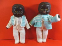 Auktion 344 / Los 12016 <br>afrikan. Farbigen-Kinderpaar, wohl USA, H-28 cm, Celluloid bzw. Hartplastik?, H-28 cm