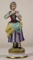 Auktion 372<br>Figur, Dame mit Rose, blaue Schwertermarke, polychr. Bemalung, linke Hand wohl Fehlteil, &auml;lter, ca. H-17cm.