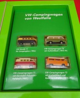 Auktion 345 / Los 12024 <br>Brekina, 4 VW Campingbusse von Westfalia, ineu n Display, 1:87, H0