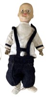 Auktion 346 / Los 12065 <br>Antike Puppe der Puppenmanufaktur Wagner &amp; Zetsche, Knabenpuppe Harald. um 1915,Alters- und Gebrauchsspuren, Halsmarke, Lederkörper mit Holzhänden, H-32 cm