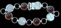 Auktion 347 / Los 1043 <br>Silber-Armband  mit 4 Bernsteinen, L-19 cm, 21,2 gr.
