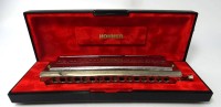 Auktion 347 / Los 16008 <br>gr. Hohner Mundharmonika "Chronomica 280 C"  in orig. Etui