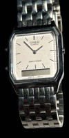 Auktion 348 / Los 2017 <br>Quartz HAU "Casio" orig. Stahlband,  weisses Zifferblatt, Werk nicht überprüft,