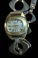 Auktion 368<br>DAU "Desira" automatic, 21 Jewels, Messingband, Werk l&auml;uft, ca. 2 x 2,5cm, Tragespuren