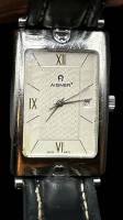 Auktion 349 / Los 2057 <br>Quartz Armbanduhr "Aigner" Nr. 464 121, Lederband, guter Zustand