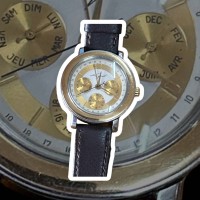 Auktion 350 / Los 2005 <br>Le Guet du Temps Automatic HAU mit orig. Band, Lunette  und Krone Gold-750-, Werk steht