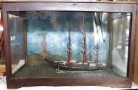 Auktion 350 / Los 16050 <br>Segelschiff-Modell "Wilhelm" in alter Tischvitrine, H-39 cm, 59x23 cm