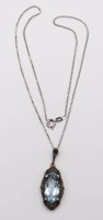 Auktion 353 / Los 1032 <br>Art-Deco Anhänger mit hellblauem facett. Stein an 835er Silber-Kette, L-42cm Anh. 3,8cm, 6,4gr.