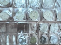 Auktion 362<br>Seite mit 22 Münzen, hpts. Jugoslaw. Dinar, 3x 5 Schilling, 1 S Austria, 1x USA