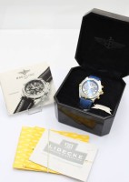 Auktion 358 / Los 2002 <br>Herrenarmbanduhr  Breitling "Crosswind" Chronograph, Roman Blue Dial - Chronograph - Automatik Kal Jahrgang 1999, Ref. B13355 43257, Werk läuft, leichte Tragespuren, orig. Box und Papiere, D-4,3cm