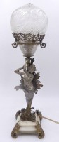 Auktion 358 / Los 16029 <br>Tischlampe bronziert, mit Putto als Lampenträger, H-45 cm