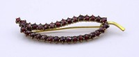 Auktion 359 / Los 1002 <br>Granat Brosche, Normgold -250- ,L- 6,5cm, 4,9gr.