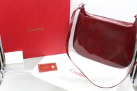 Auktion 359 / Los 13003 <br>Damen-Handtasche, Cartier, Happy Birthday Collection, Lackleder, sehr gute Erhaltung, ca. 25,5 x 30,5cm, orig. Karton