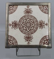 Auktion 360 / Los 9016 <br>antike Fliese als Untersetzer, Metallrahmen, ca. 16,5 x 16,5cm